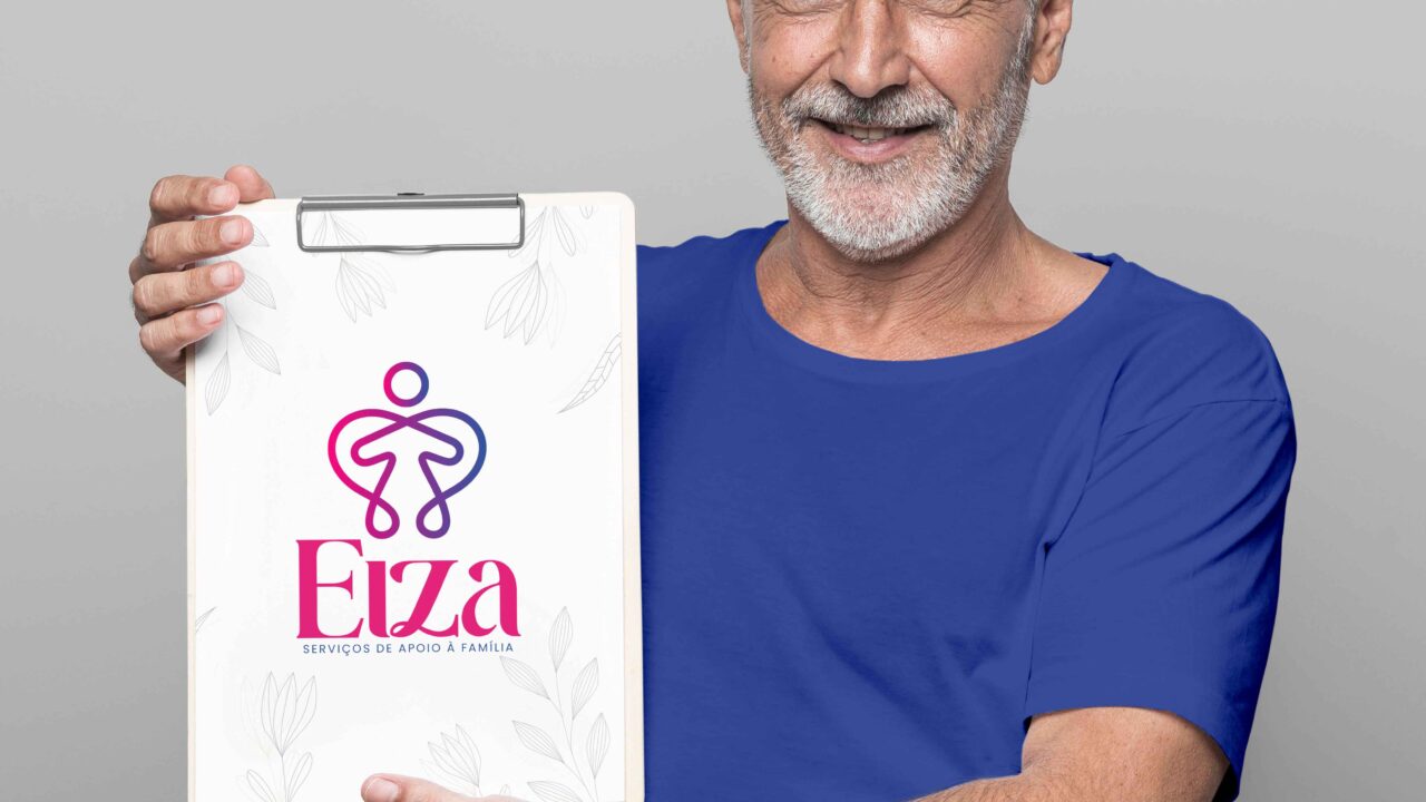 a man holding a sign that says elza make by af studio