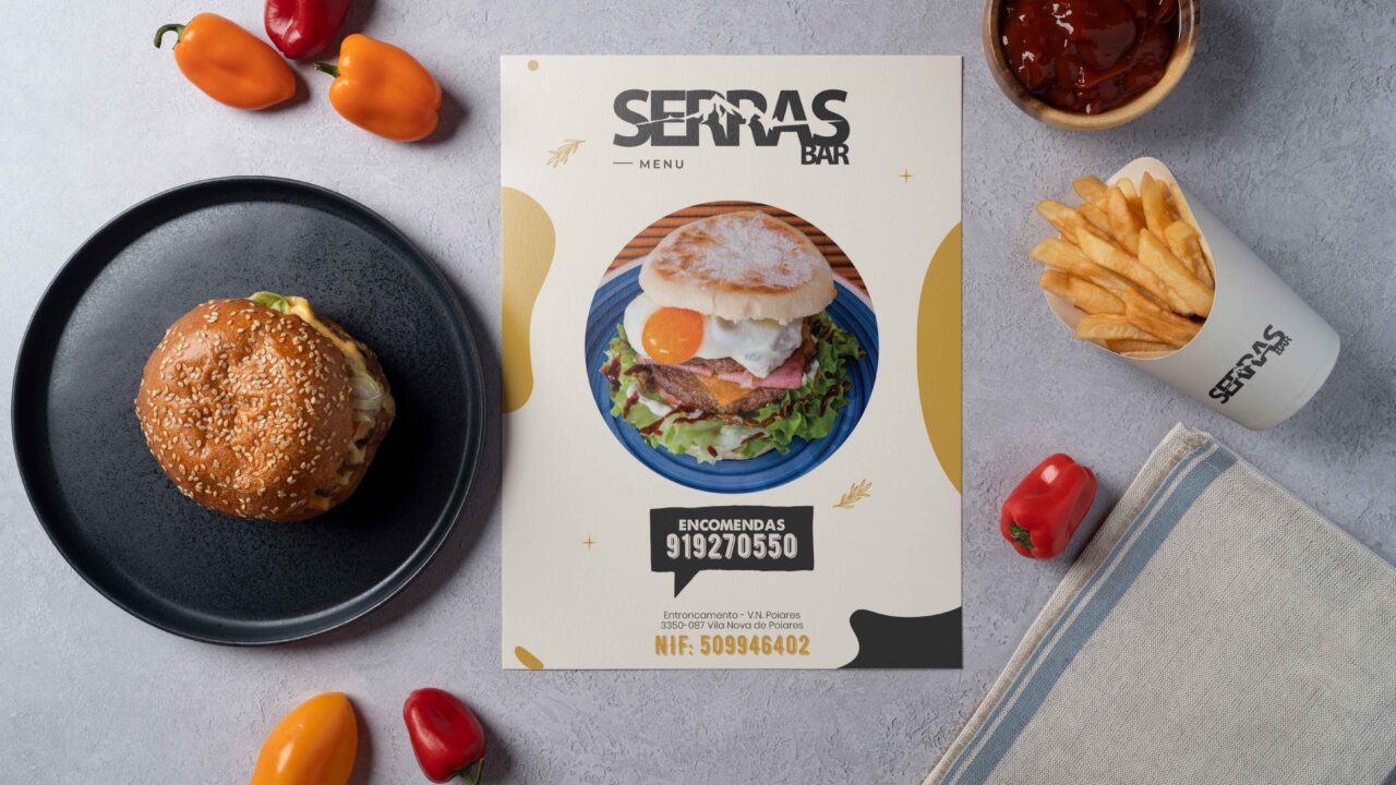 a magazine with a picture of a burger on it serras bar by af studio