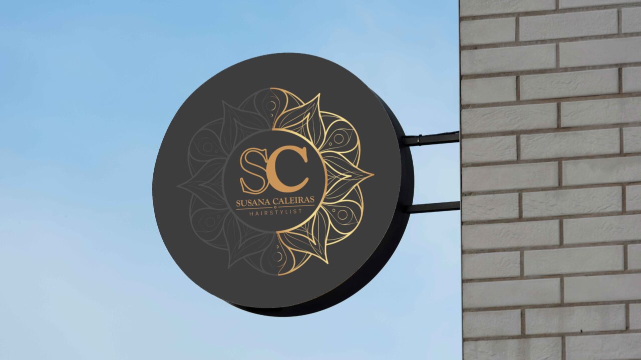 a black and gold sign hanging off the side of a building make by af studio